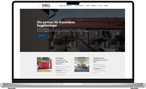 Laptop som visar Nordic Building Groups webbplats med bostadshus och bygglösningar.